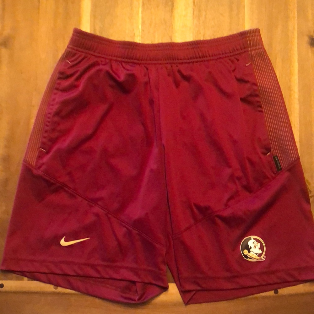 Barely worn FSU Garnet with Gold Striped sides Nike On Field shorts Size Medium